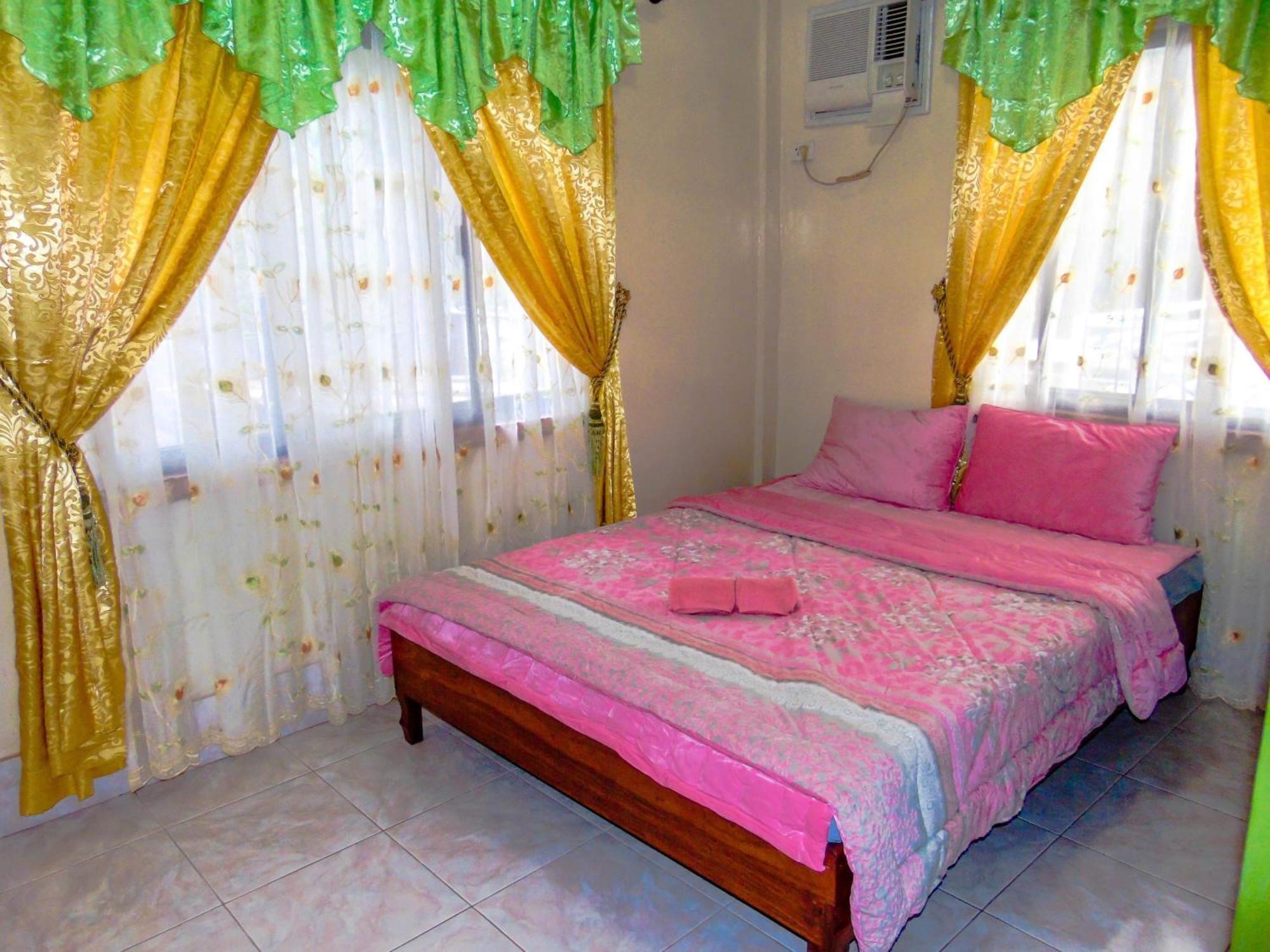 Pangulatan Beach Resort إل نيدو الغرفة الصورة